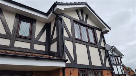 mock tudor cladding replacement